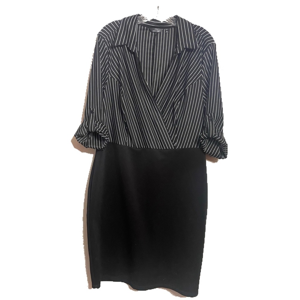 Black dress with pinstripe top and bodycon black bottom.